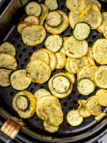 Air Fried Squash and Zucchini in basket of air fryer.