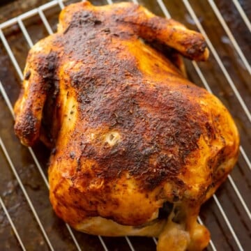 Rotisserie Chicken on baking rack.