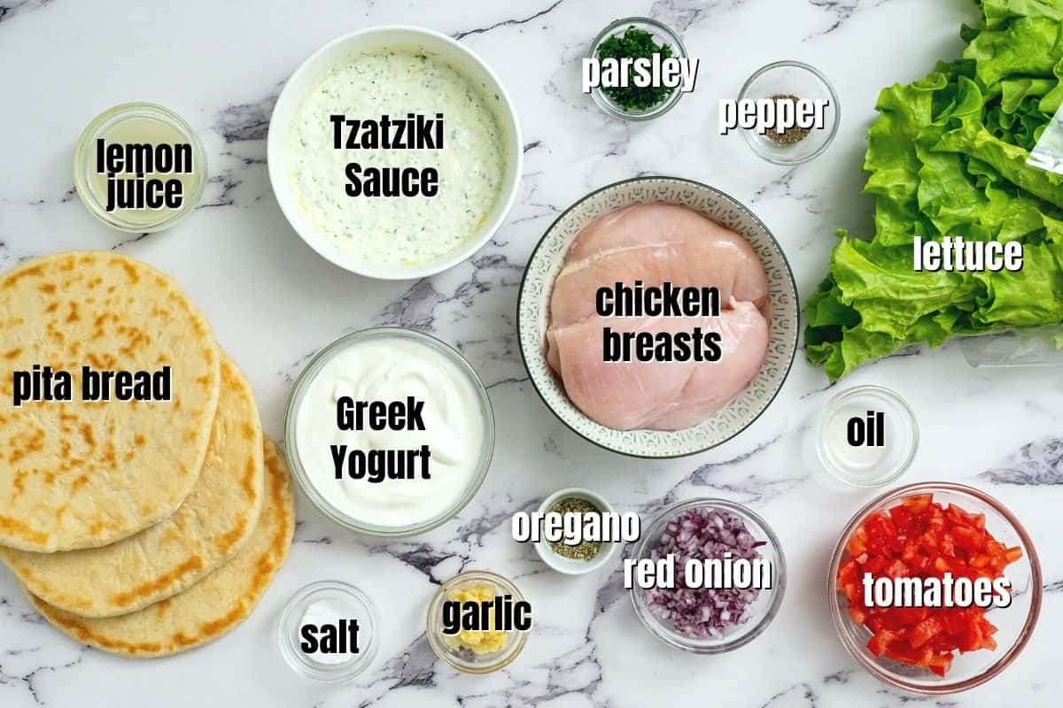 Ingredients for chicken gyros labeled on counter.