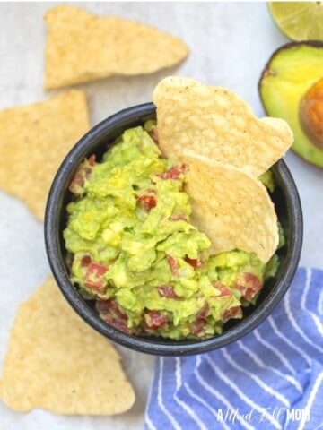 Bowl of Guacamole with chips.