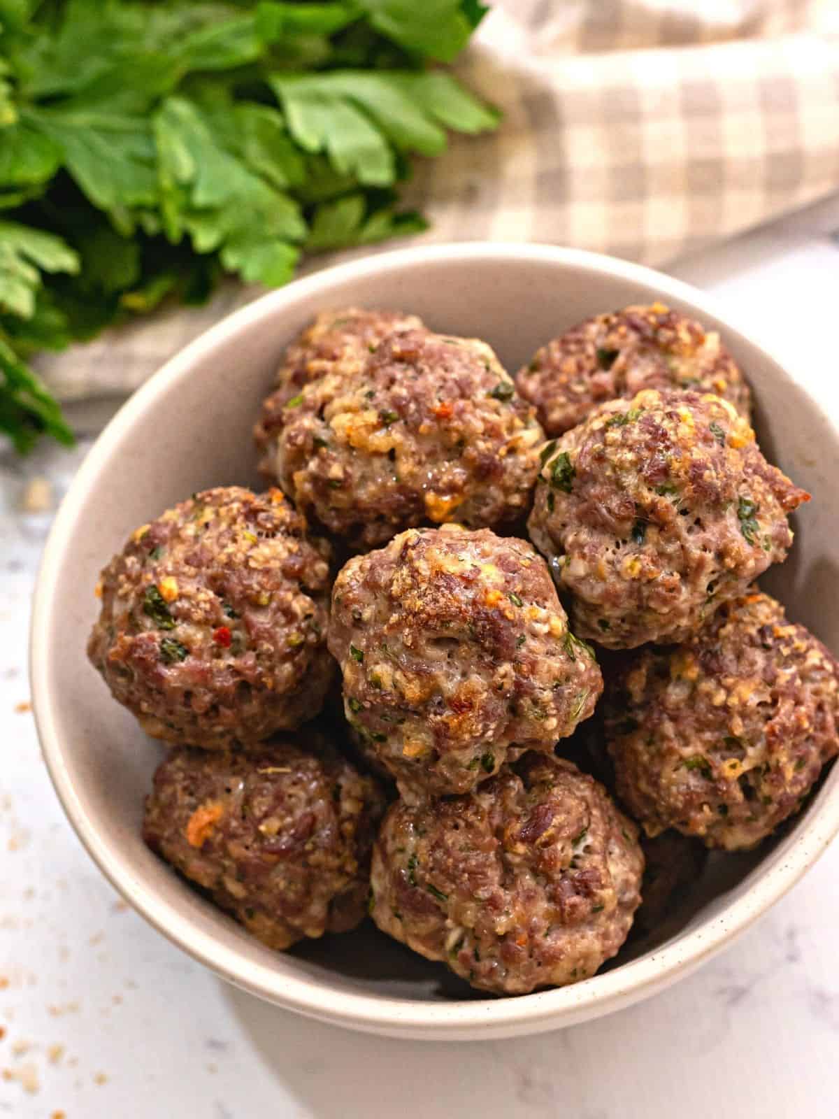 Bowl of baked meatballs. 