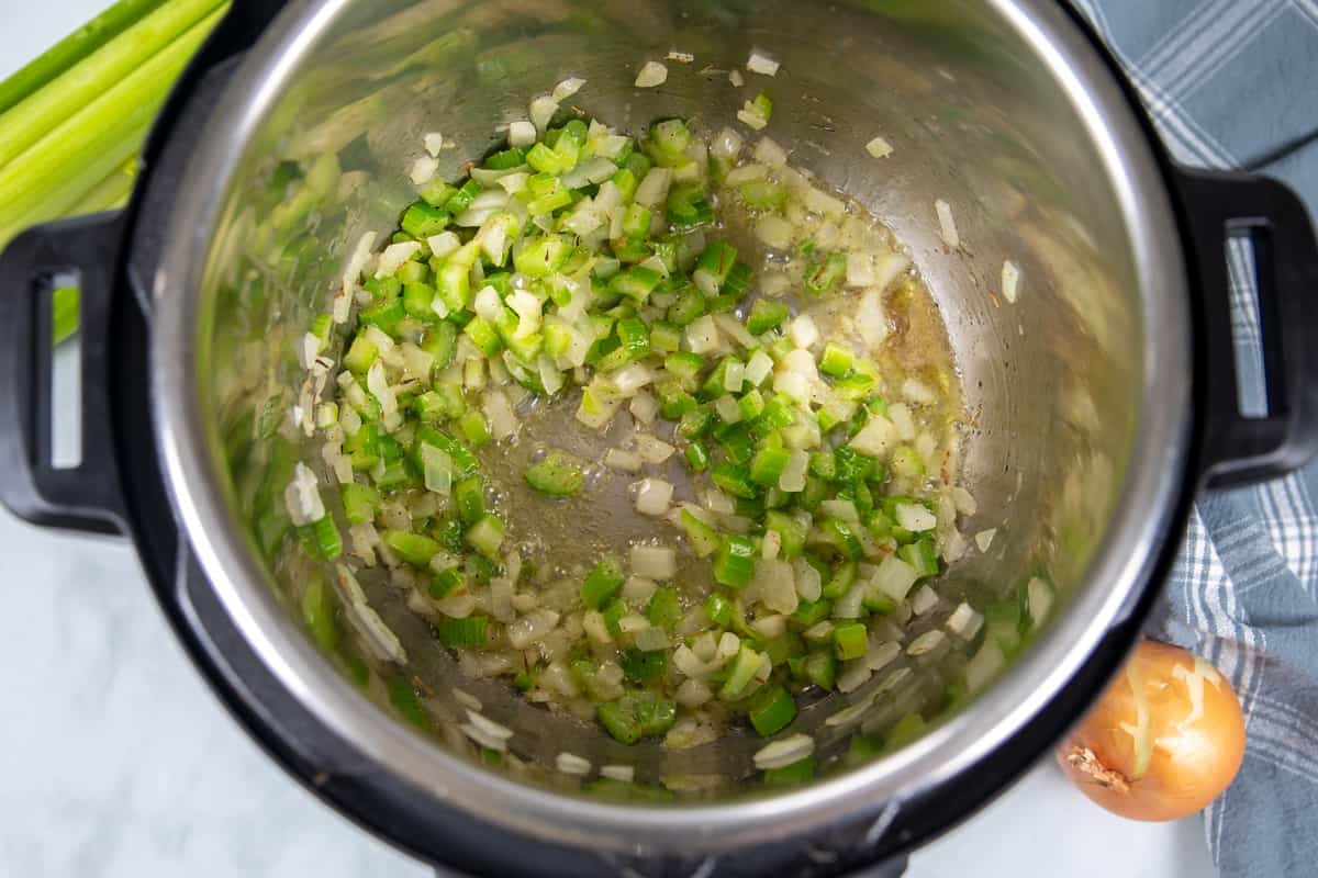 Onions and celery sauteed in the Instant Pot. 