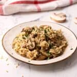 Rice Pilaf in bowl with Mushrooms and Parsley.