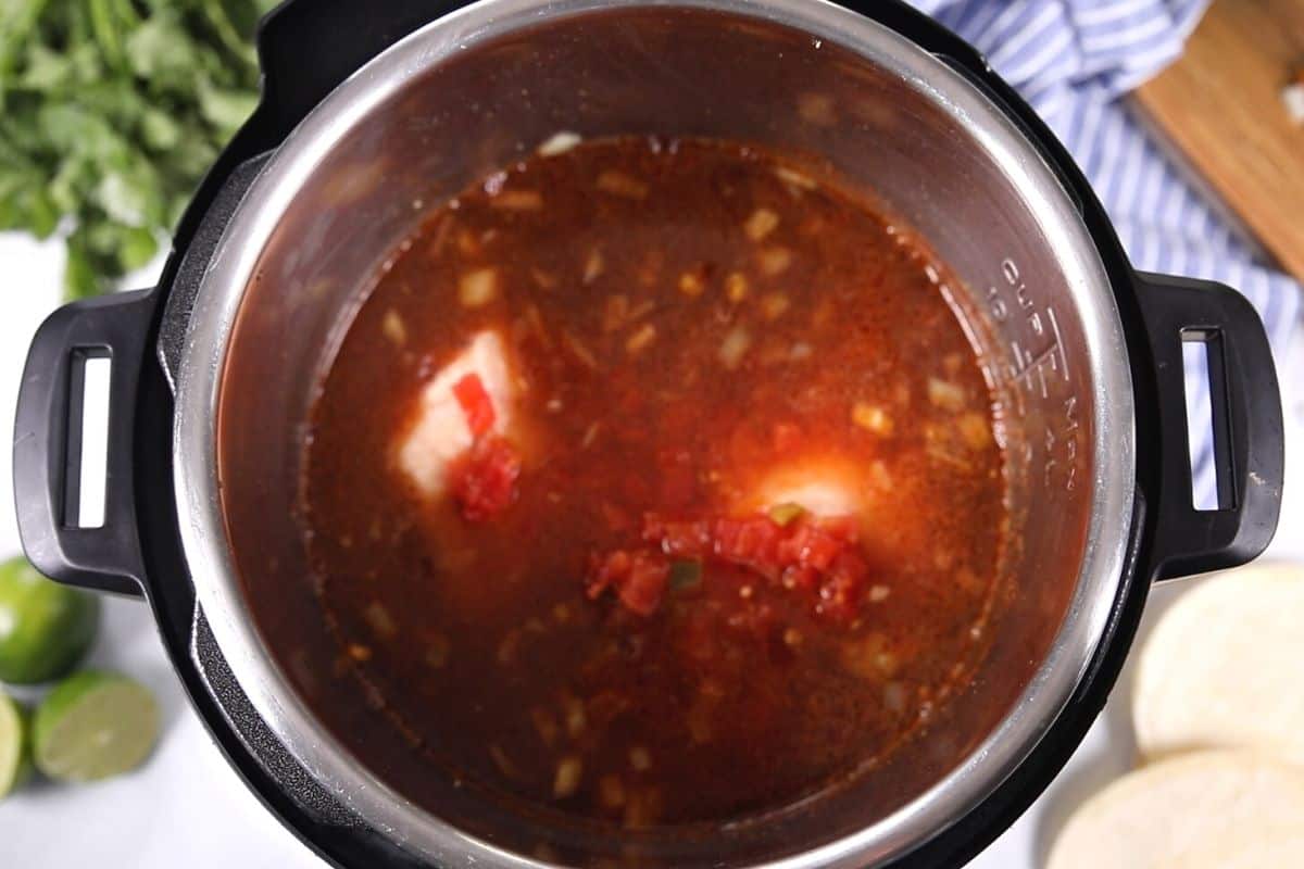Ingredients for Tortilla Soup in inner pot of Instant Pot. 