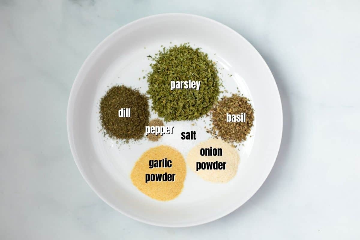 Ingredients for Ranch Seasoning in white dish labeled with text.