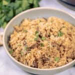 Instant Pot Rice Pilaf in gray serving bowl.