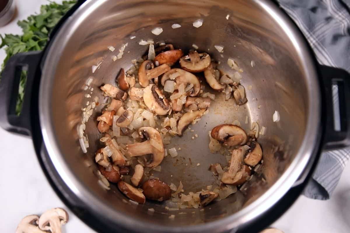 Mushrooms and Onions Sauteed in inner pot.