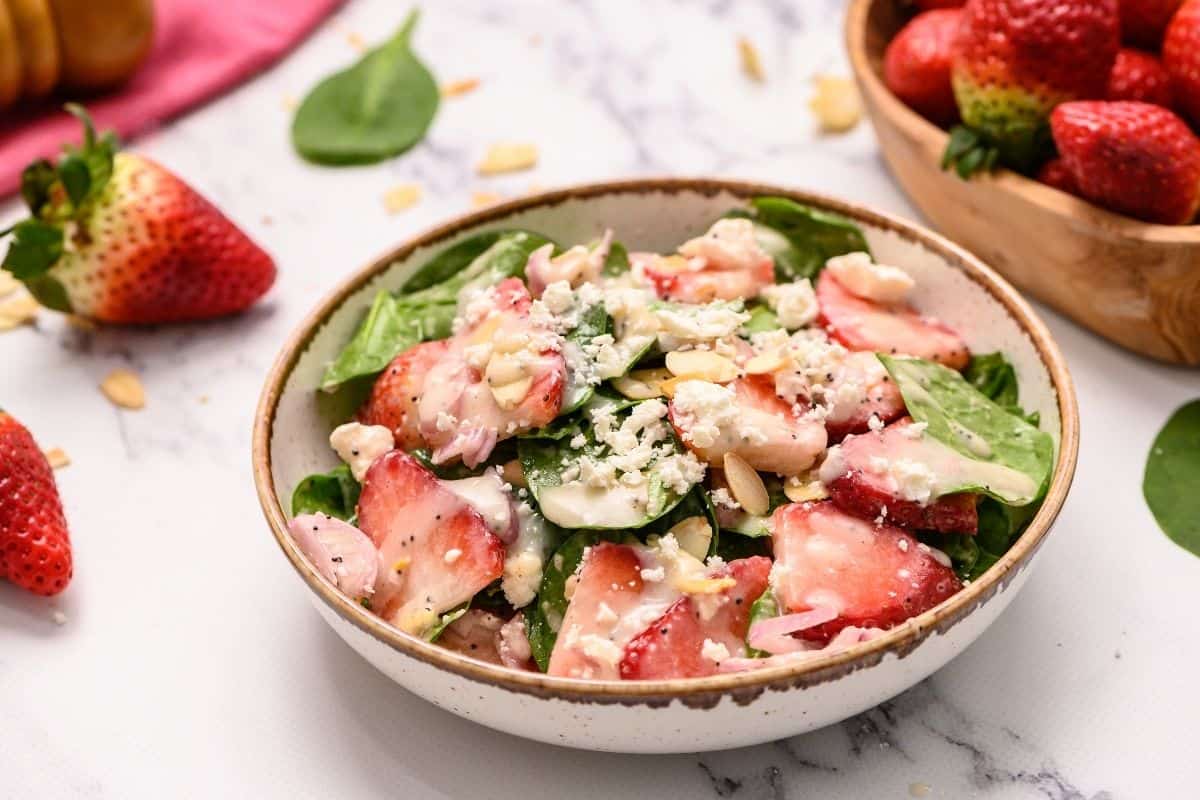 Bowl of prepared Spring Strawberry Spinach Salad.
