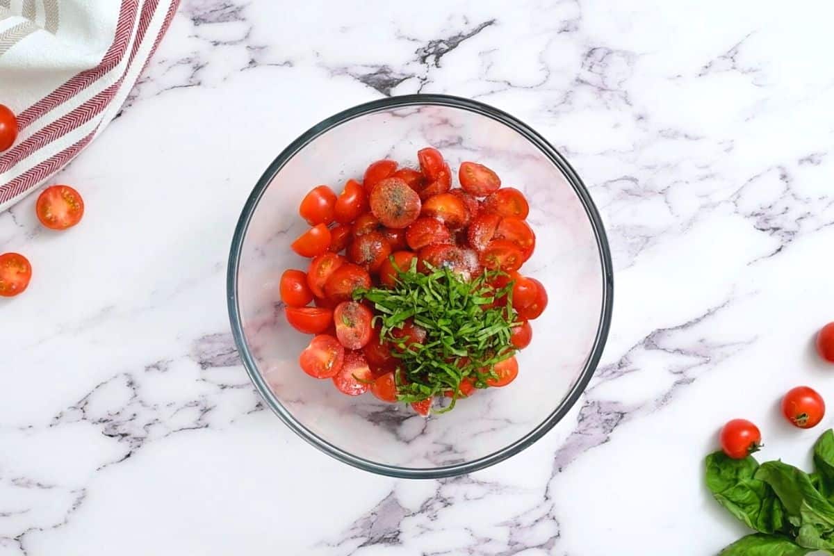 Grape tomatoes tossed with basil, salt and pepper.