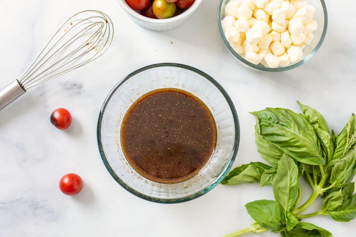 Balsamic Dressing in small bowl for pasta salad.