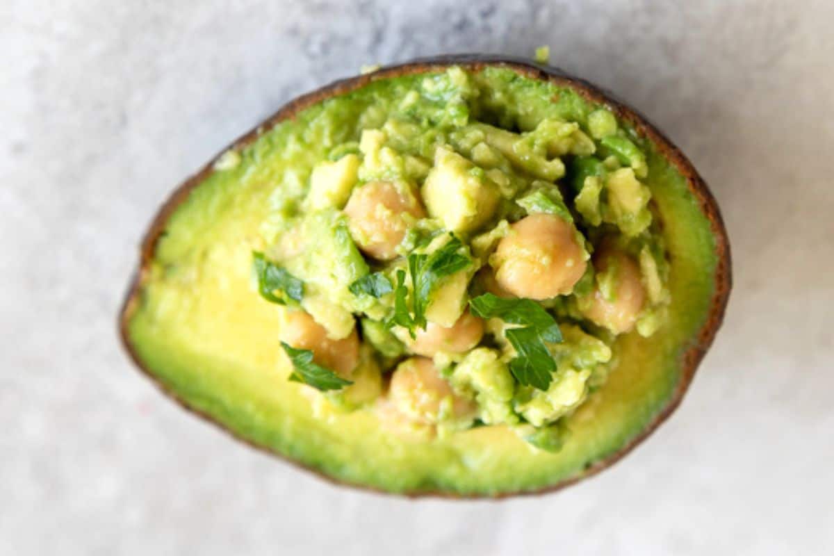 Chickpea salad in hollowed out avocado.
