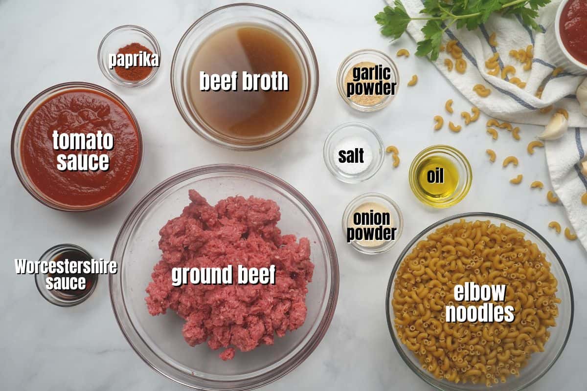 Ingredients for hamburger helper labeled on counter.