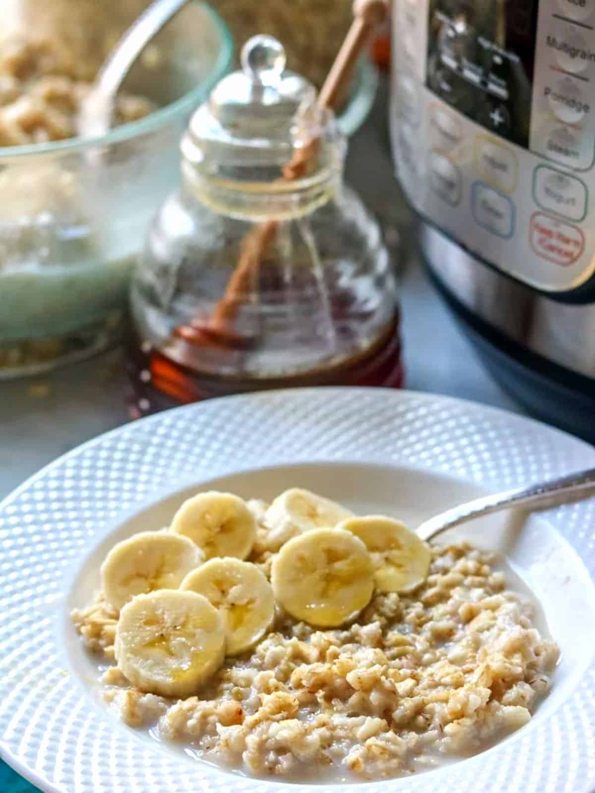 Bowl of Oatmeal next to instant pot.