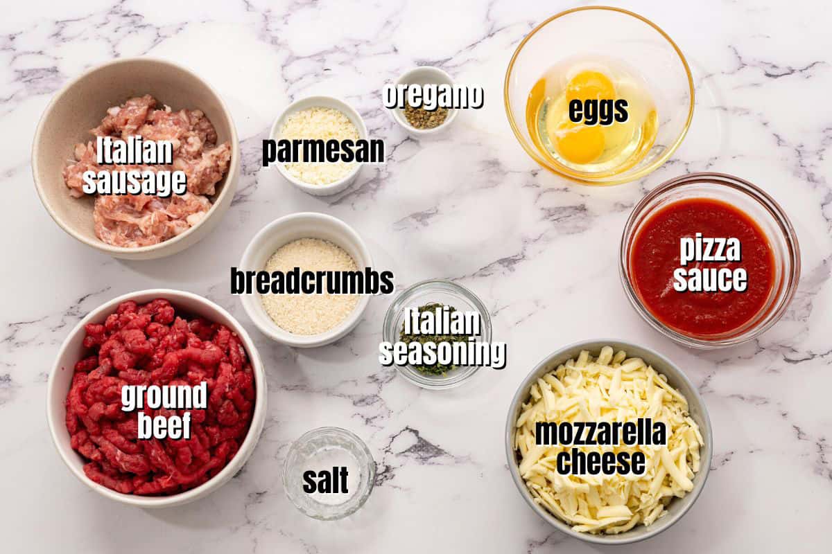 Ingredients for pizza meatloaf labeled on counter.