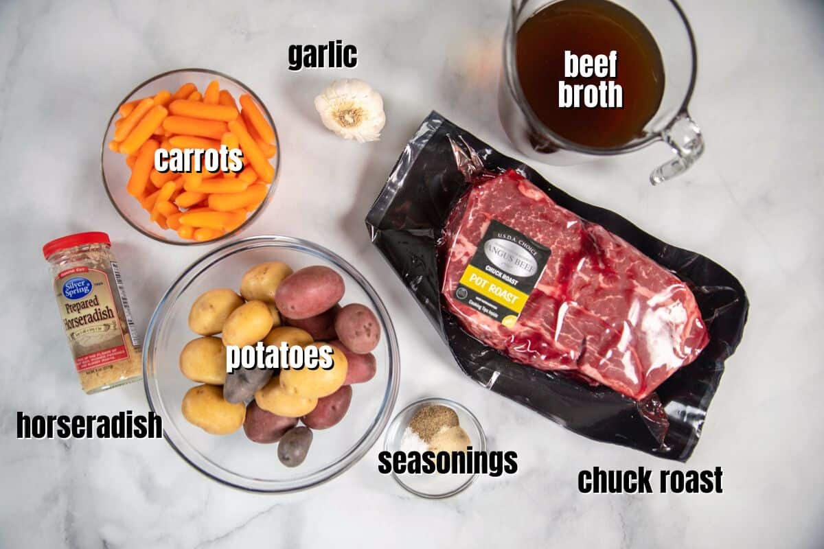 Ingredients for pot roast labeled on counter.