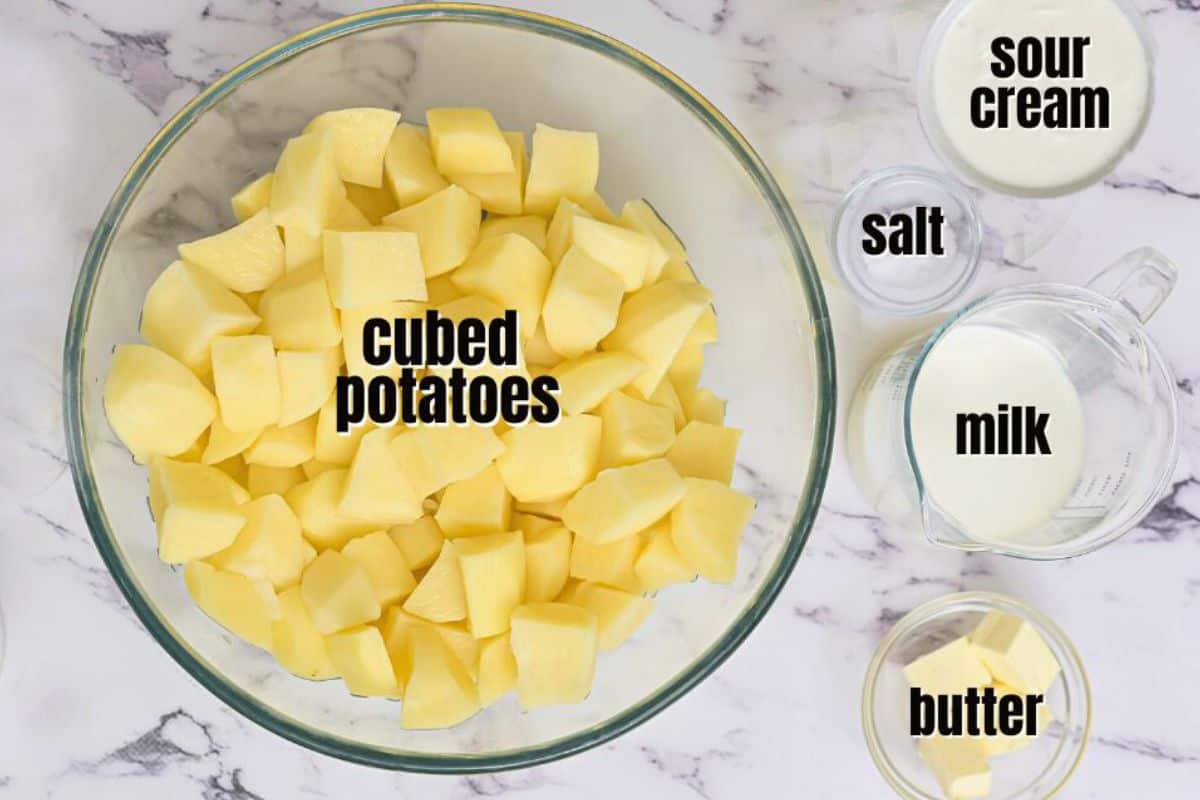 Ingredients for instant pot mashed potatoes labeled on counter.
