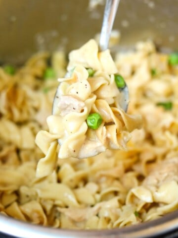 Spoonful of tuna noodle casserole coming out of the Instant Pot.