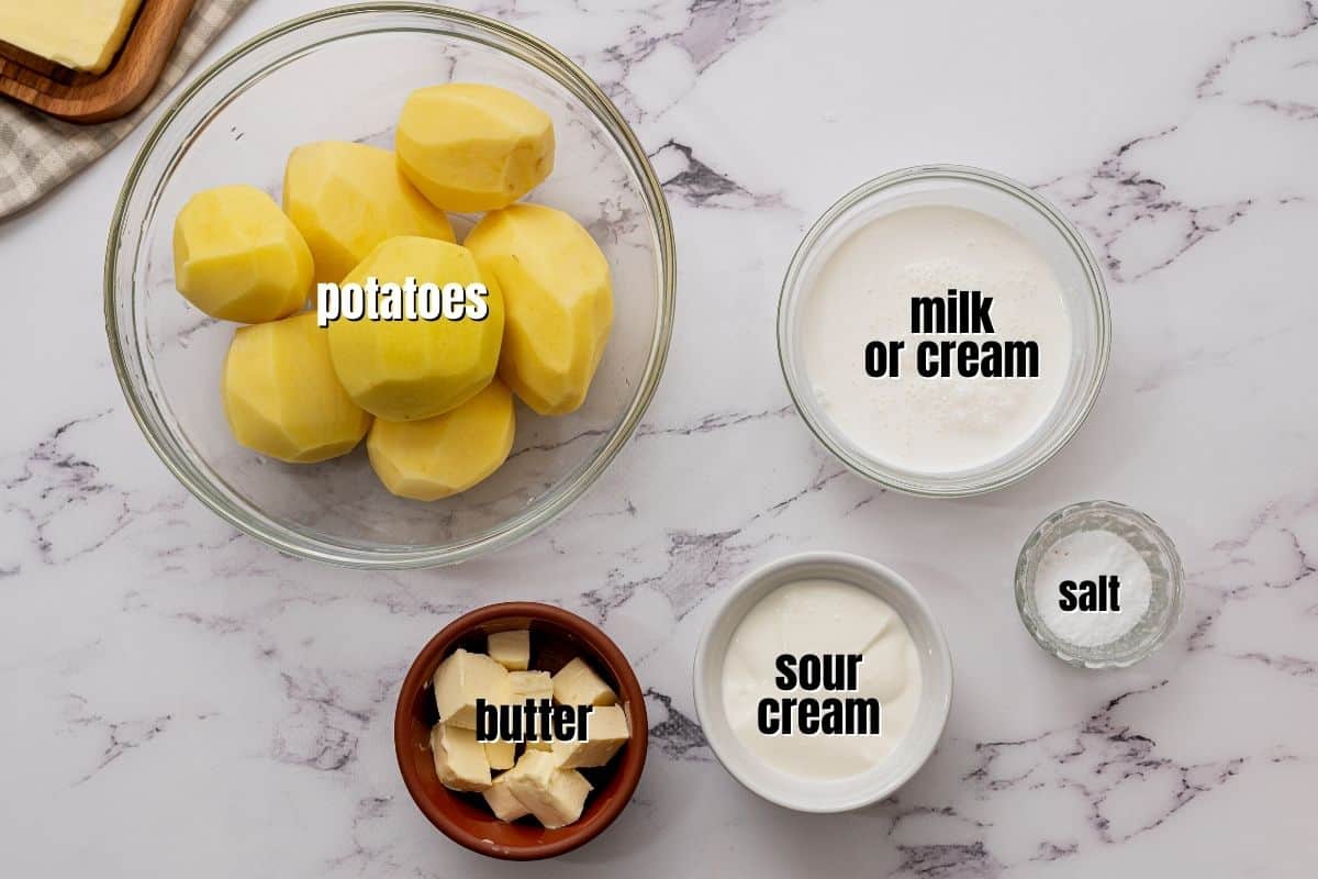 Ingredients for classic mashed potatoes labeled on counter.