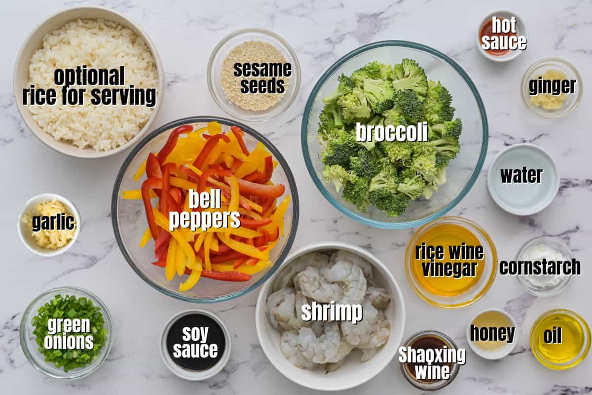 Ingredients labeled on counter for shrimp stir fry.