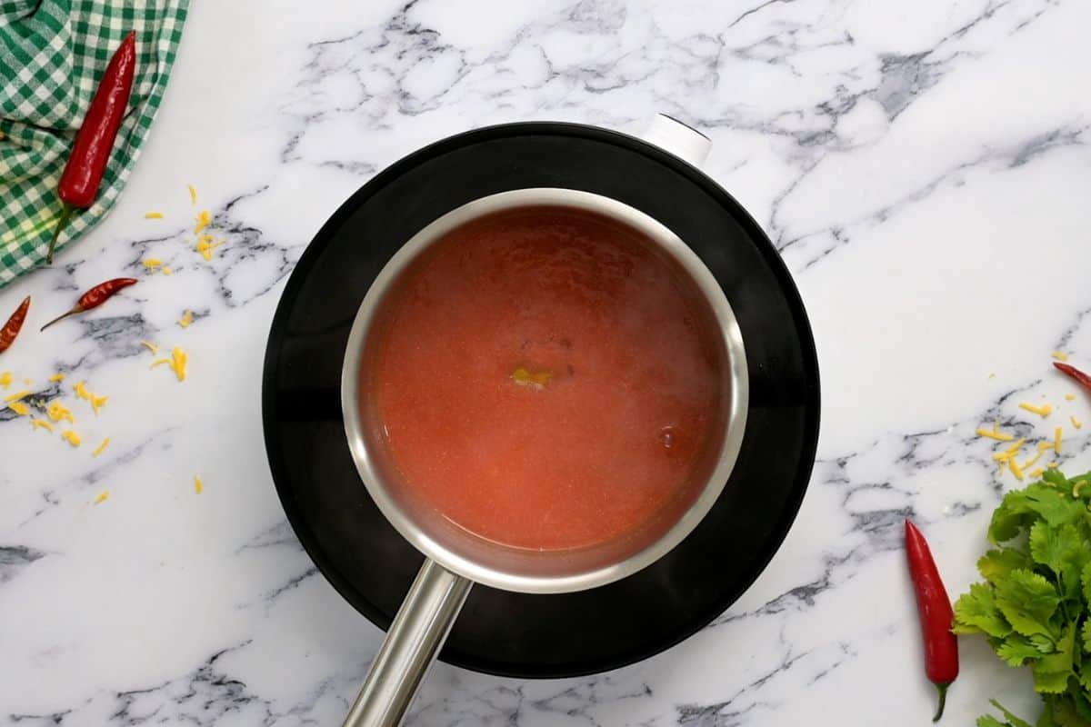 Buffalo Sauce in saucepan after adding honey.