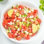 Bowl of watermelon salsa with cucumbers and feta.