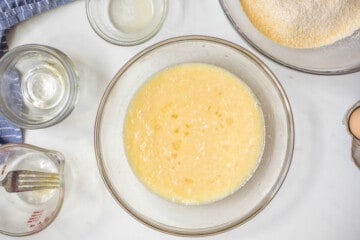 Buttermilk, honey, and butter mixed together in mixing bowl.