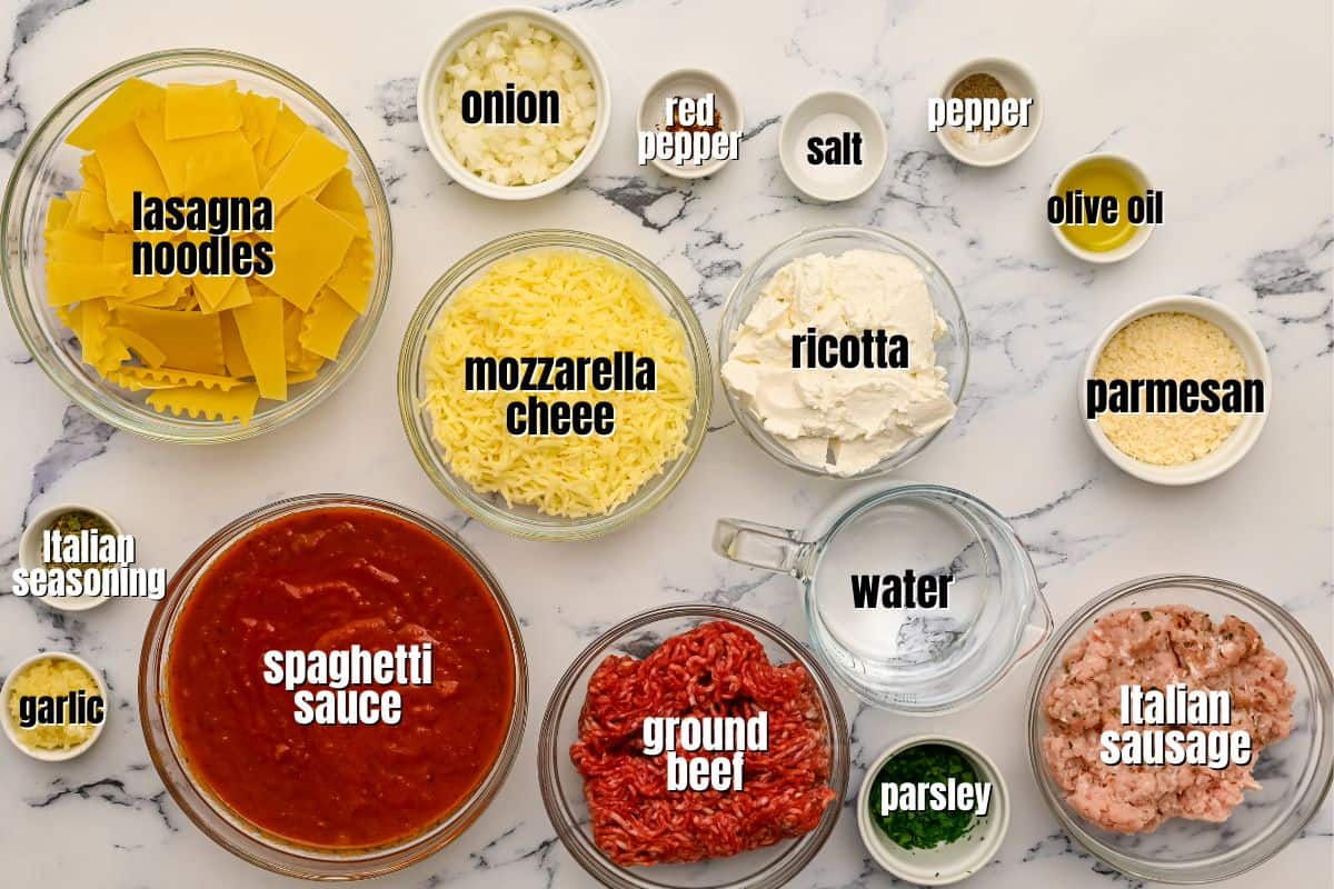Ingredients for skillet lasagna labeled on counter.