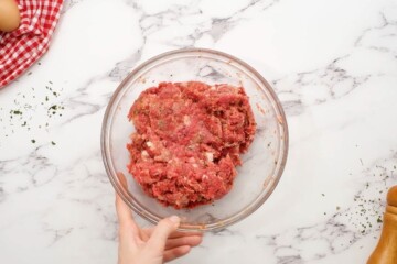 Meatloaf mixture in large mixing bowl.