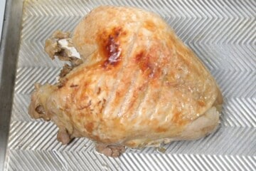 Turkey Breast on baking pan after broiling.