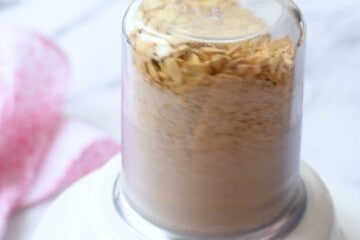 Oats in small blender being blended.