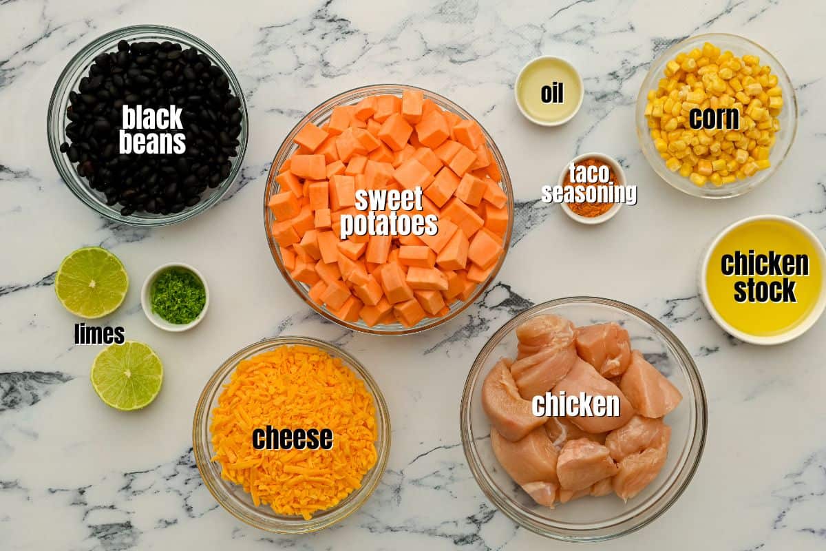 Ingredients for chicken sweet potato skillet labeled on counter.