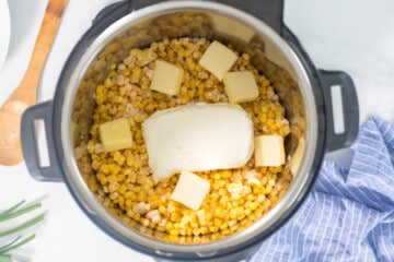 Instant Pot filled with ingredients for Creamed Corn before pressure cooking.