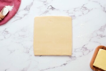 Shortbread Cookie dough shaped in 8x8 square.