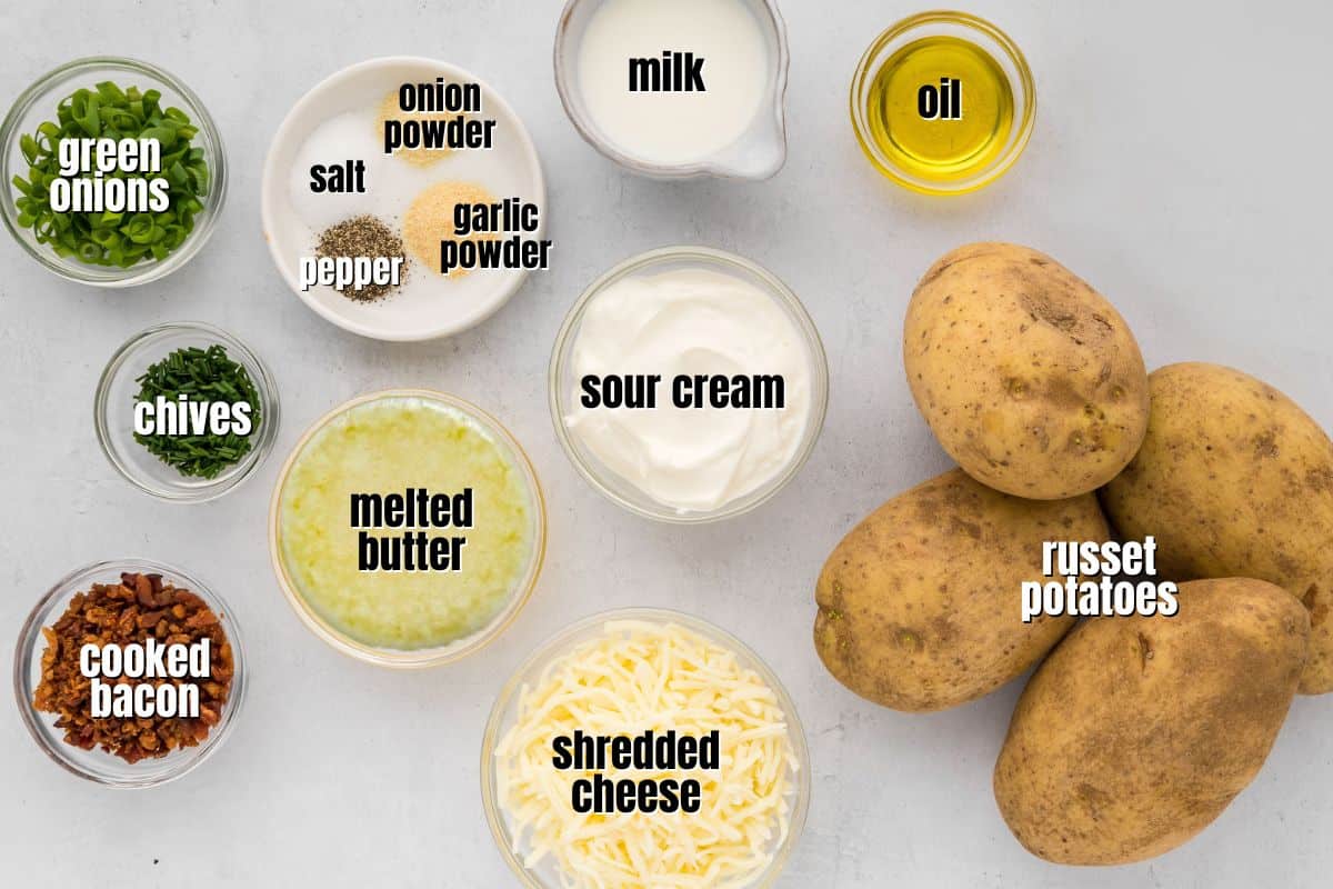 Ingredients for twice baked potatoes labeled on counter.