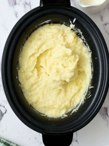 Creamy mashed potatoes in crockpot.