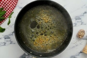 Saute pan with garlic, seasonings, and chicken stock.