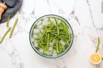 Green Beans in ice bath after simmering.