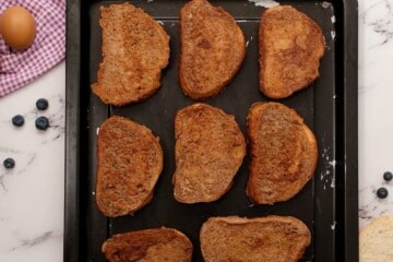 Pan-fried French Toast on baking sheet.
