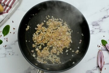Shallot Sauteed in olive oil in skillet.