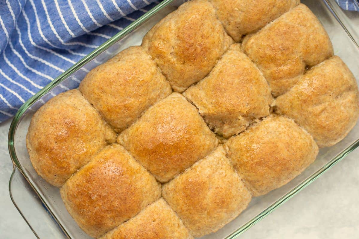 Baked Whole Wheat Rolls in glass baking dish.