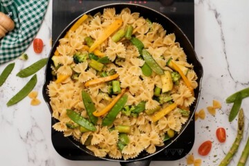 Pasta tossed with sauteed veggies in large skillet.