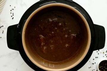 Thickened teriyaki sauce inside inner pot of pressure cooker.