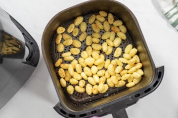 Crispy Air Fried Gnocchi in basket after air frying.