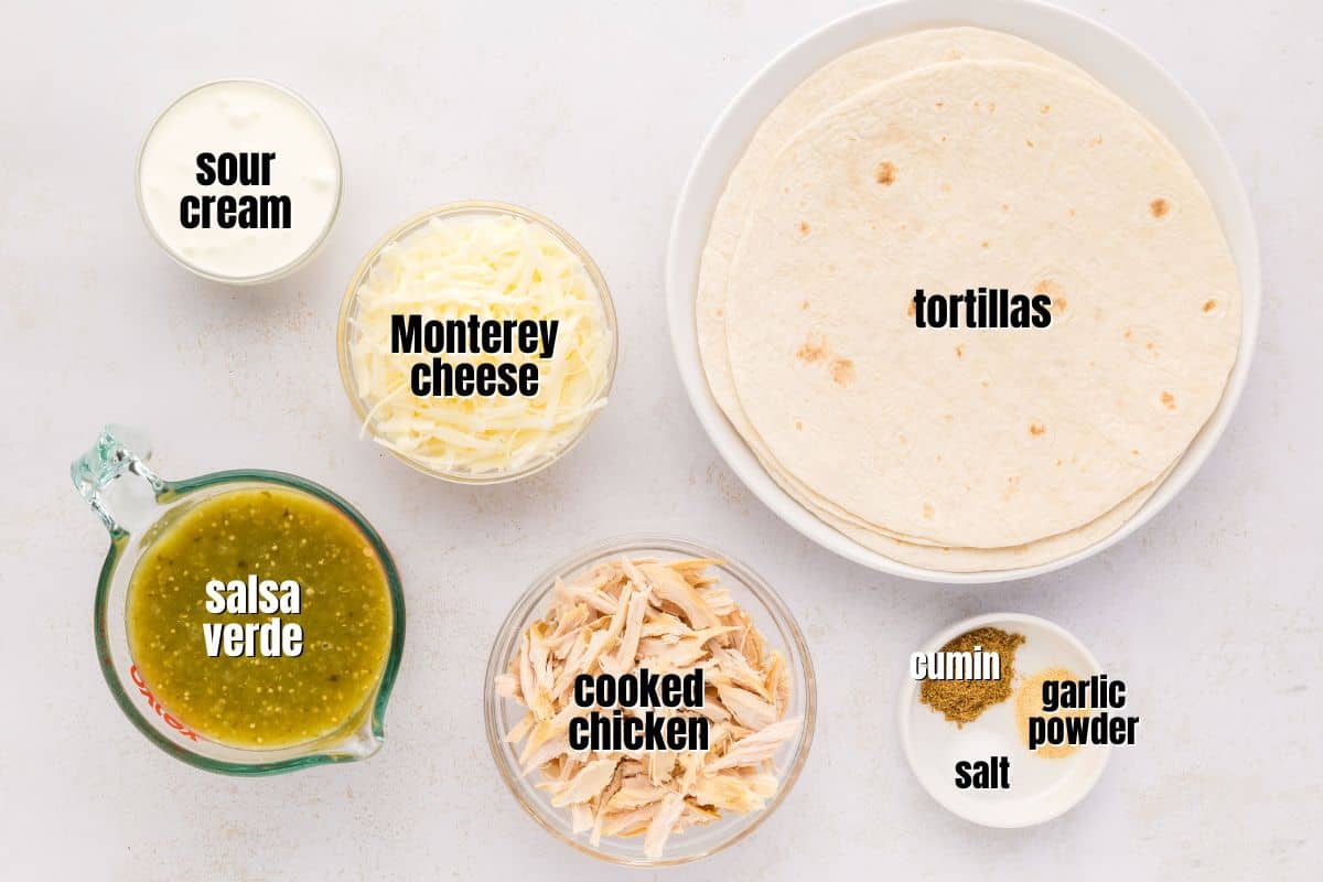 Ingredients for salsa verde chicken enchiladas labeled on counter.