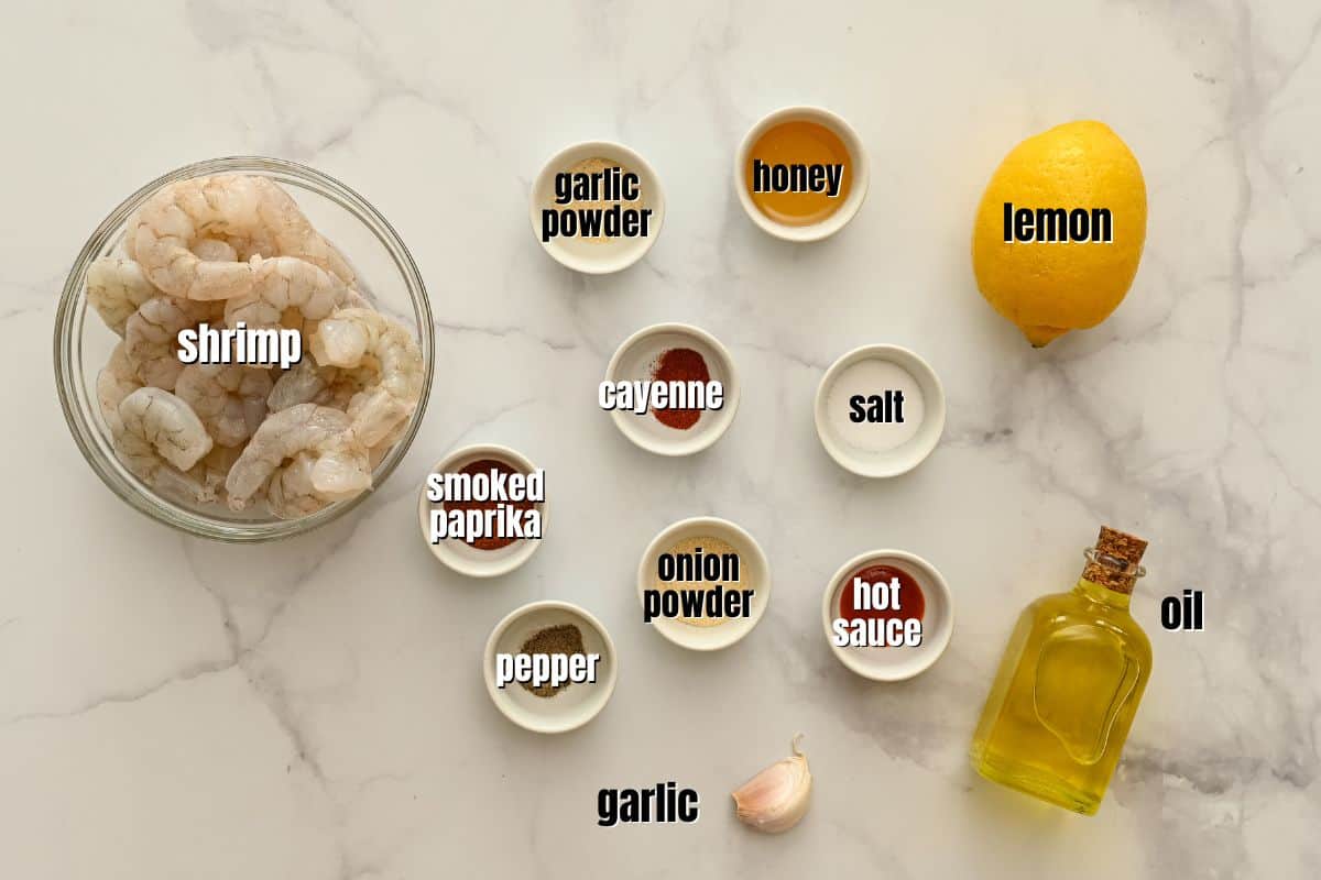 Ingredients for air fryer shrimp on counter.