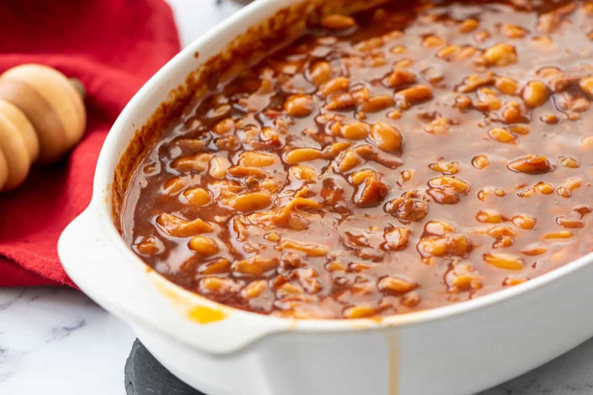 Baked Beans in large white casserole dish.
