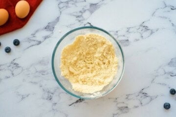 Butter mixed into flour and sugar until crumbly.