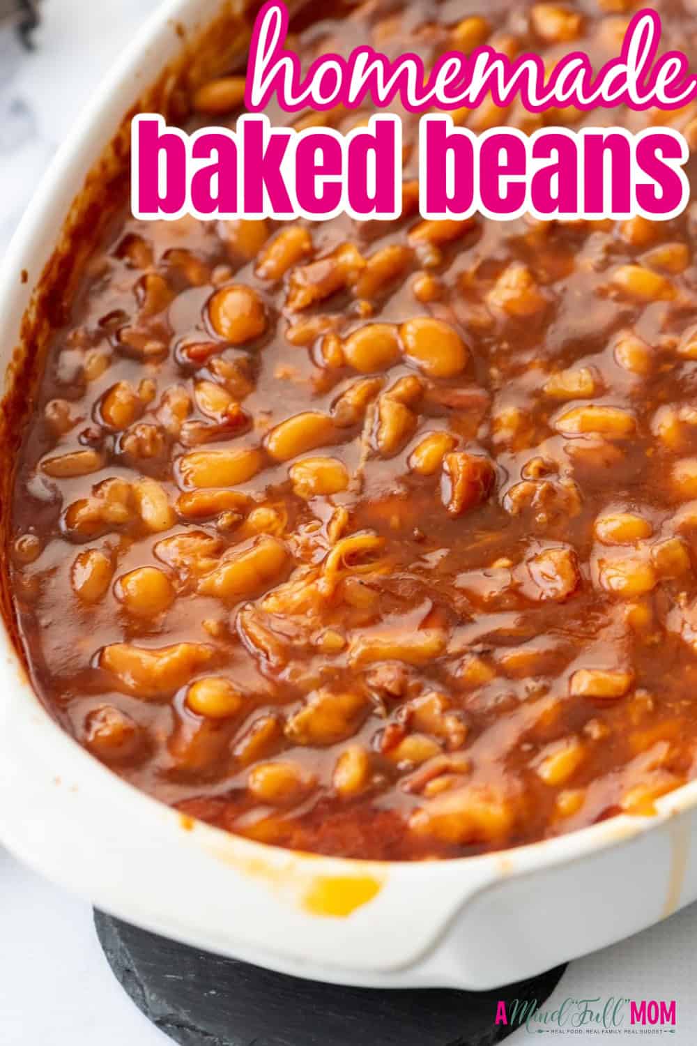 These Old Fashioned Baked Beans are made from scratch with a sweet and savory sauce. This heirloom homemade baked beans recipe has been in my family for generations and guarantees the BEST Baked Beans you will ever have! 