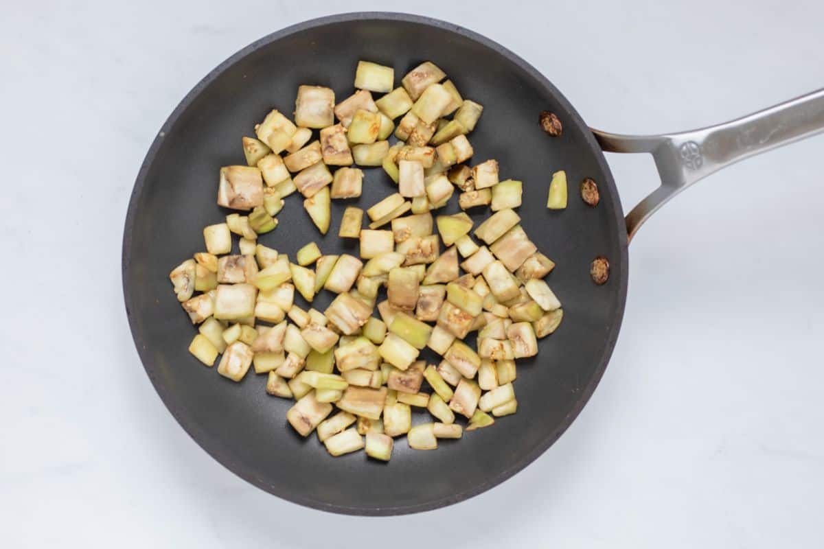 Cubed eggplant sauteed in small frying pan until just golden.