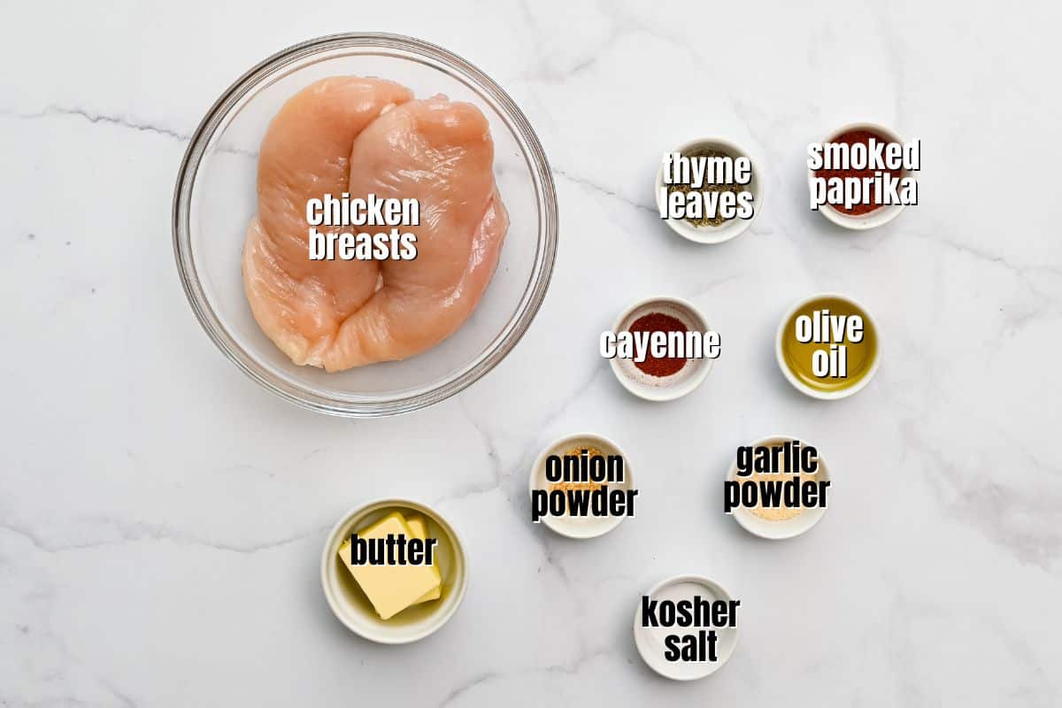 Ingredients for Blackened Chicken Recipe labeled on counter.